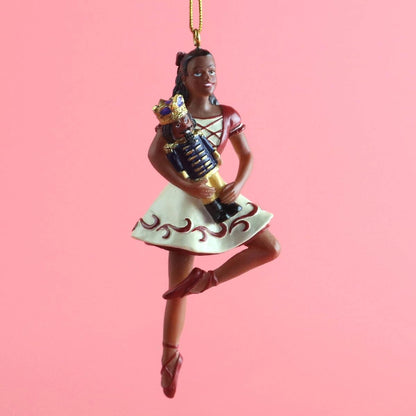 This image features a detailed ornament of Clara on pointe, part of the Clara on Pointe with Nutcracker collection by an unspecified brand.