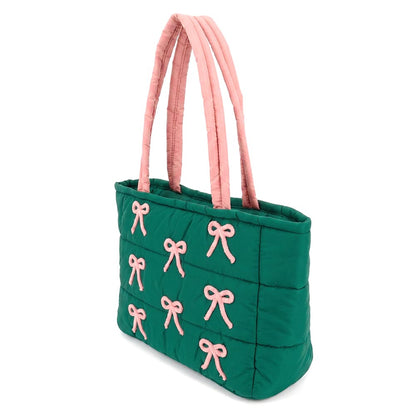 A stylish quilted tote bag in a vibrant green color, featuring multiple pink bow embroidery accents on the front.