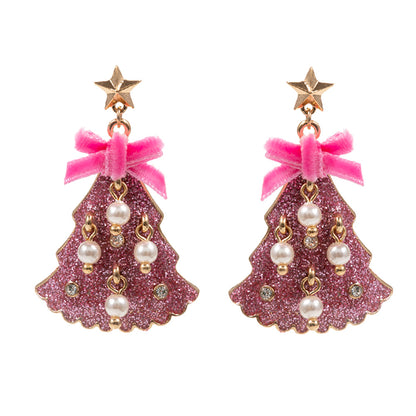 Pink glittered enamel holiday tree dangle earrings feature a festive design with a gold star topper and a pink velvet bow.