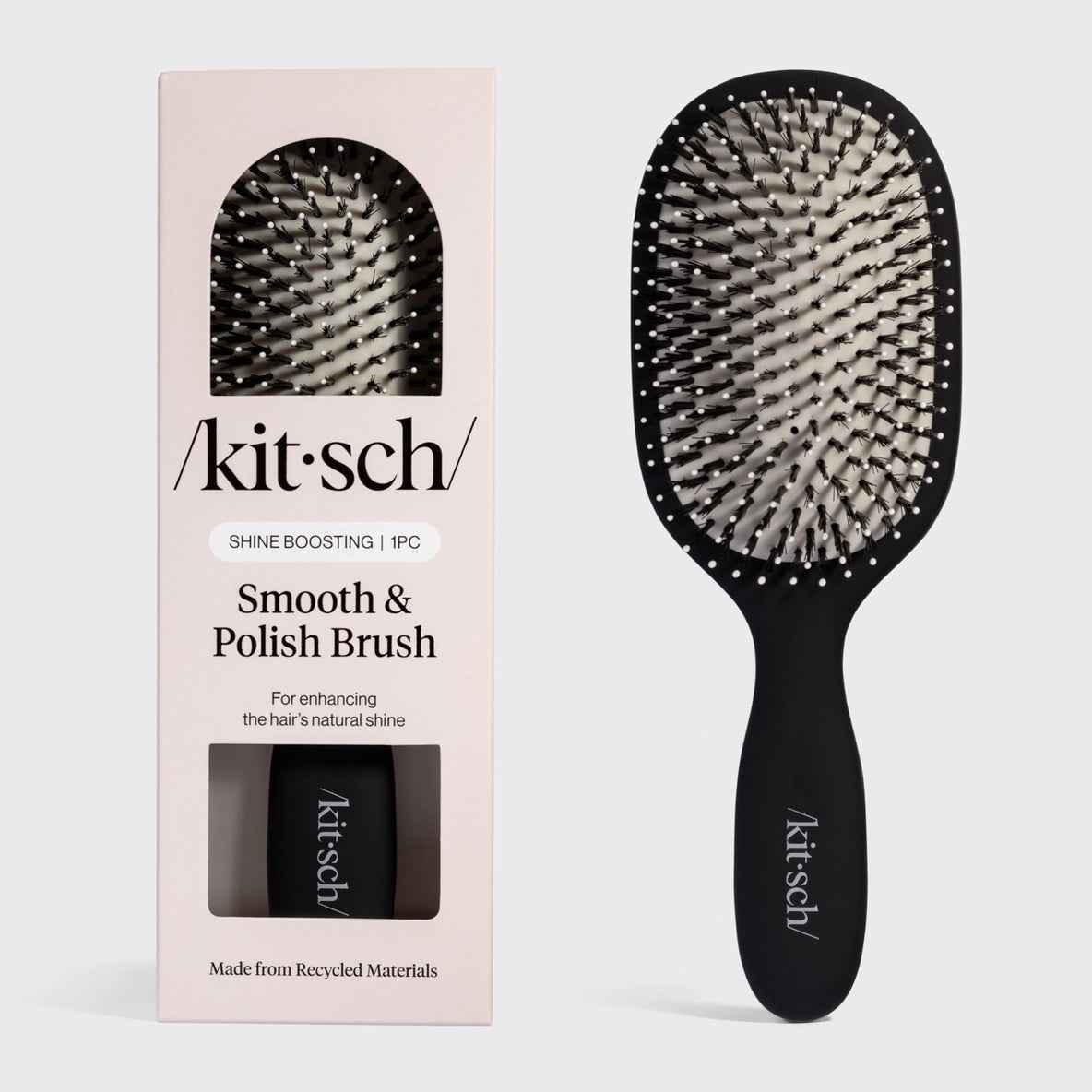 The image features a Kitsch Smooth & Polish Brush, showcasing a sleek black handle and a broad brush head with dual-bristle technology.
