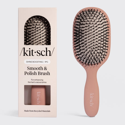 The image features a Kitsch Smooth & Polish Brush, showcasing its dual-bristle technology with a combination of vegan boar and nylon bristles.