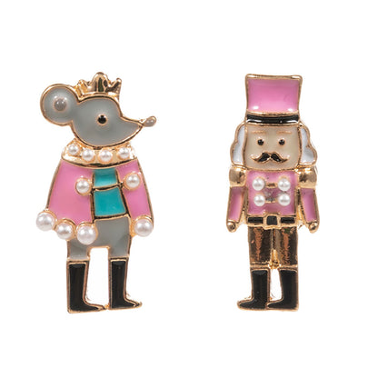 This image features a pair of whimsical stud earrings designed as a nutcracker and a mouse king. The mouse is adorned with a crown, pearls, and colorful attire, while the nutcracker wears a tall hat and is embellished with a mustache,.