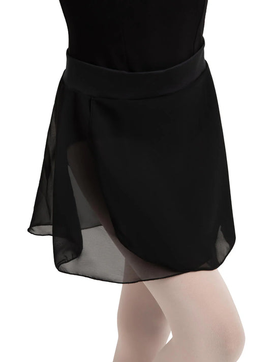 A young dancer is wearing a Girls Pull-On Skirt by the brand, made from lightweight black 100% Polyester Chiffon.
